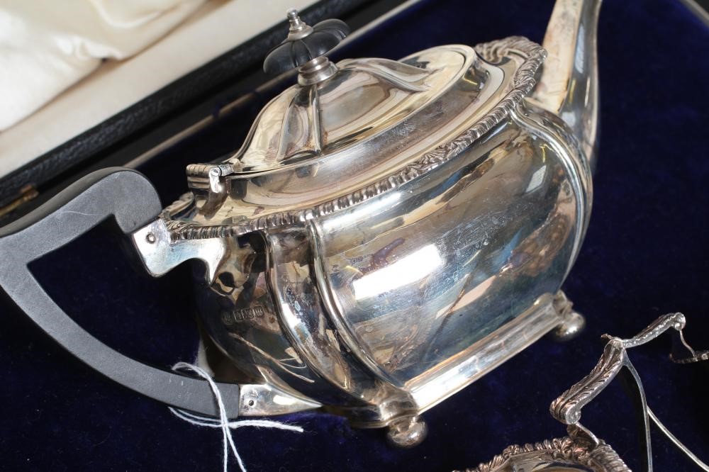 A BACHELOR'S COMPOSITE EDWARDIAN THREE PIECE TEA SERVICE Image