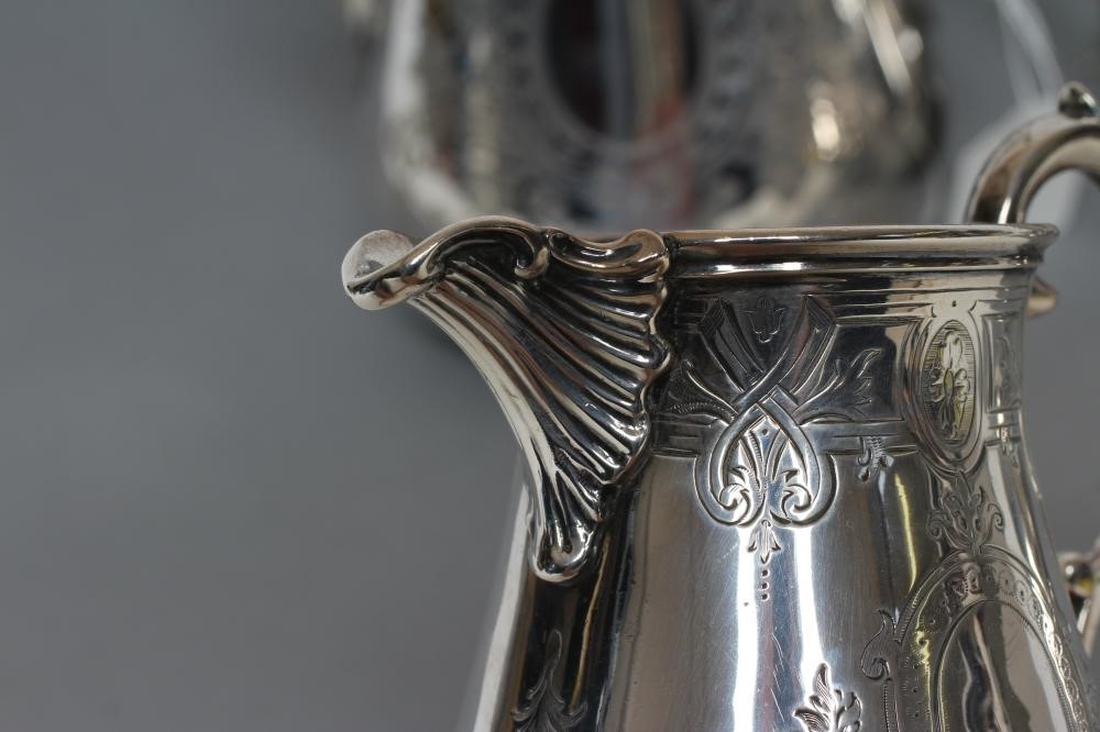 A COMPOSITE VICTORIAN THREE PIECE TEA AND COFFEE SERVICE Image