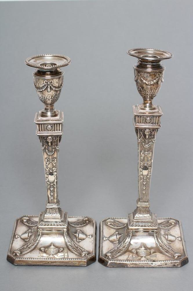 A PAIR OF LATE VICTORIAN NEO CLASSICAL STYLE CANDLESTICKS Image