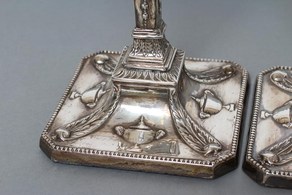 A PAIR OF LATE VICTORIAN NEO CLASSICAL STYLE CANDLESTICKS Image