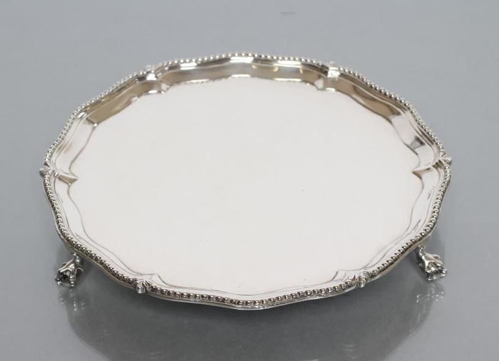 A LATE GEORGE III SMALL SALVER Image