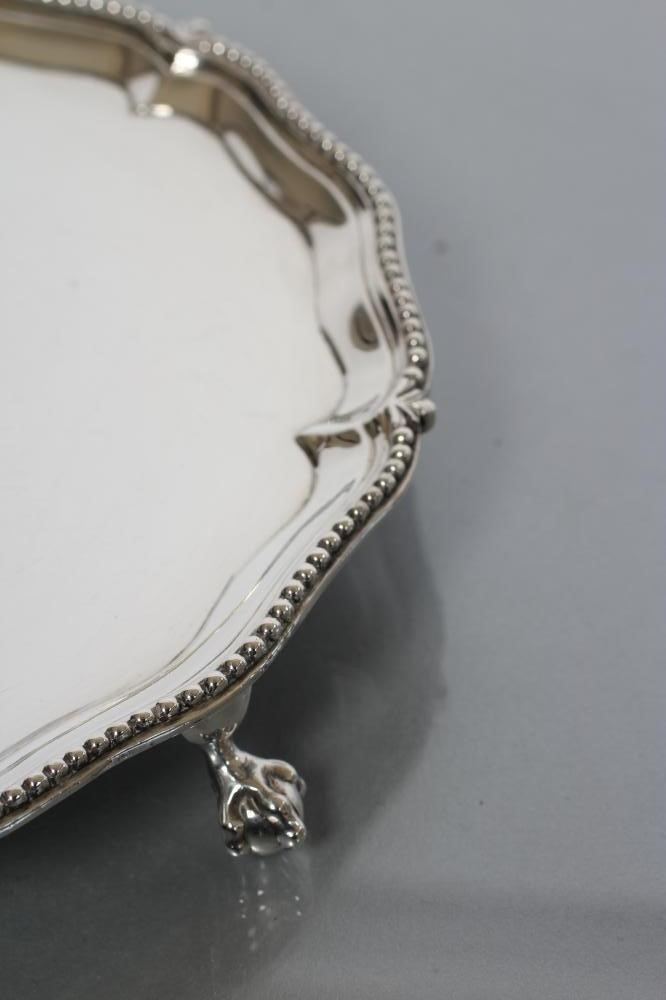 A LATE GEORGE III SMALL SALVER Image