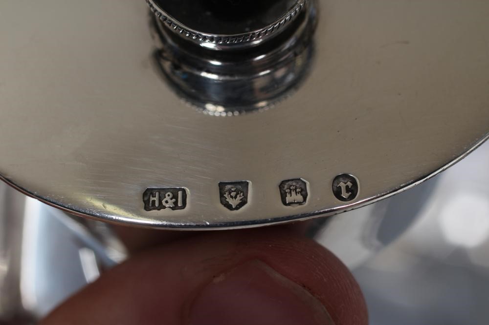 A LATE VICTORIAN SCOTTISH SMALL SPIRIT KETTLE Image