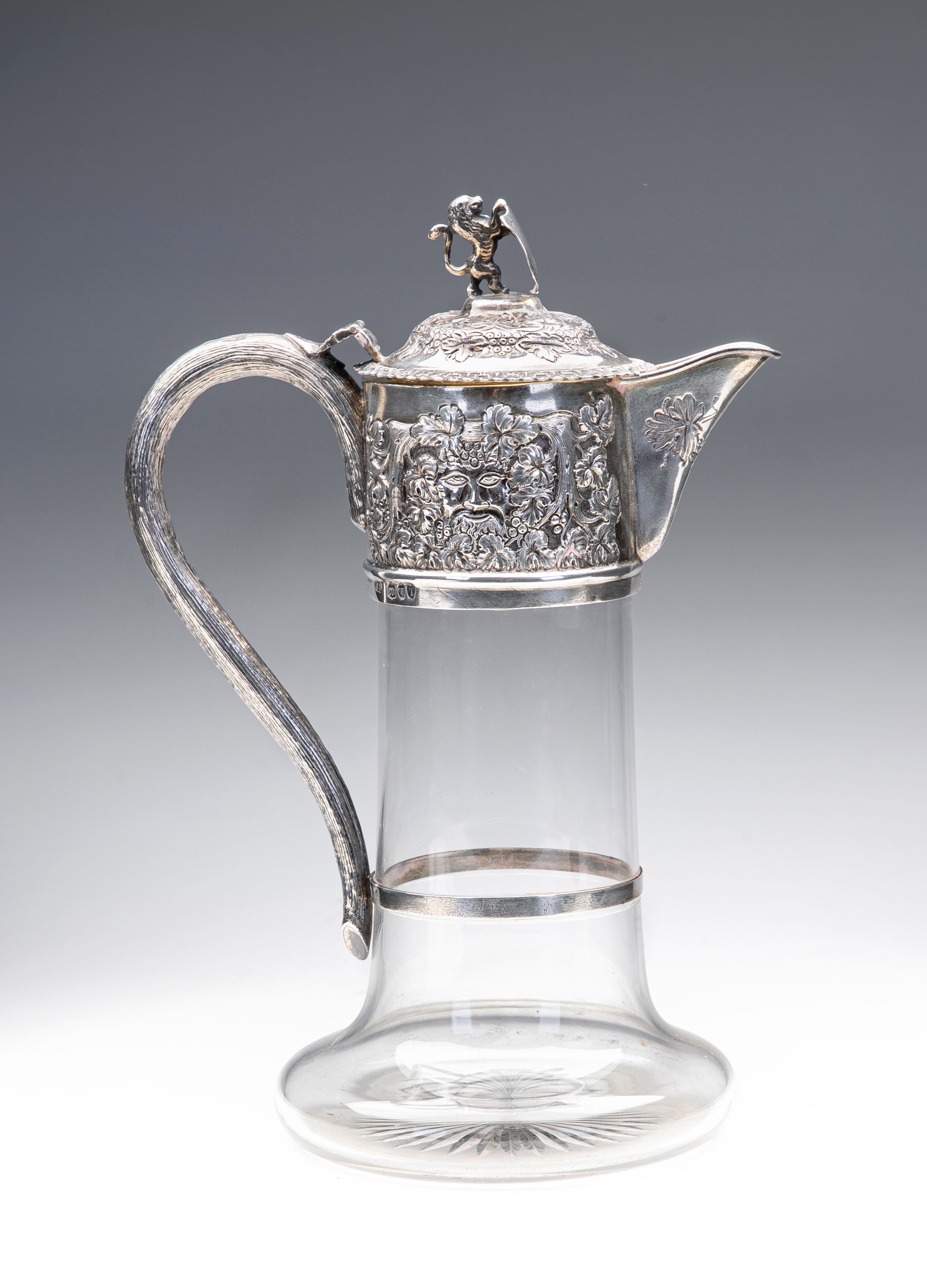 A LATE VICTORIAN GLASS CLARET JUG Image