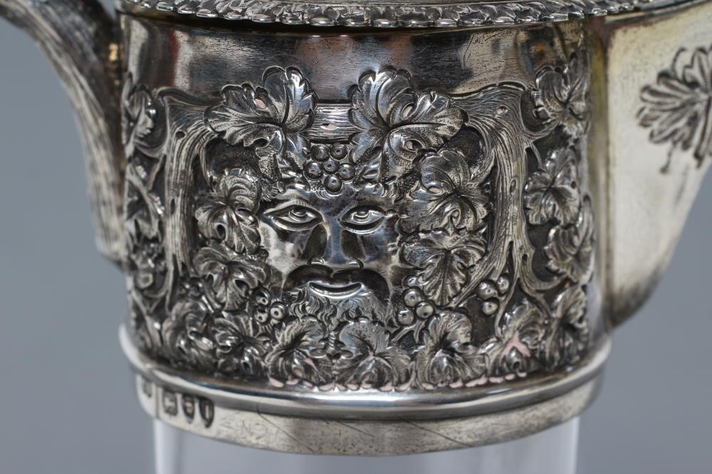 A LATE VICTORIAN GLASS CLARET JUG Image