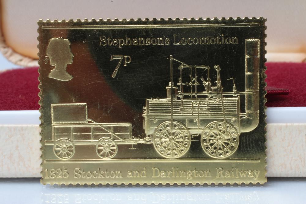 AN ELIZABETH II 22CT GOLD "THE LOCOMOTION" REPLICA POSTAGE STAMP Image