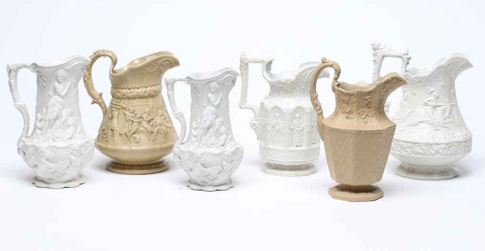A COLLECTION OF SIX EARLY VICTORIAN SMEAR GLAZED STONEWARE JUGS Image