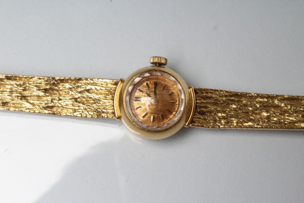 A LADY'S 18CT GOLD OMEGA WRISTWATCH Image