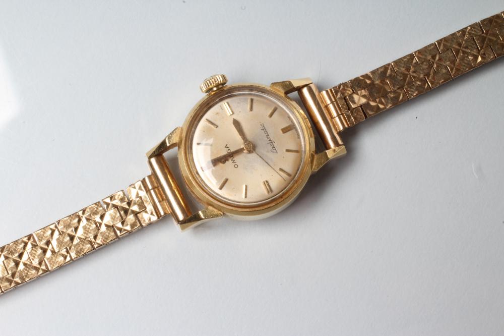 A LADY'S 18CT GOLD OMEGA "LADYMATIC" WRISTWATCH Image