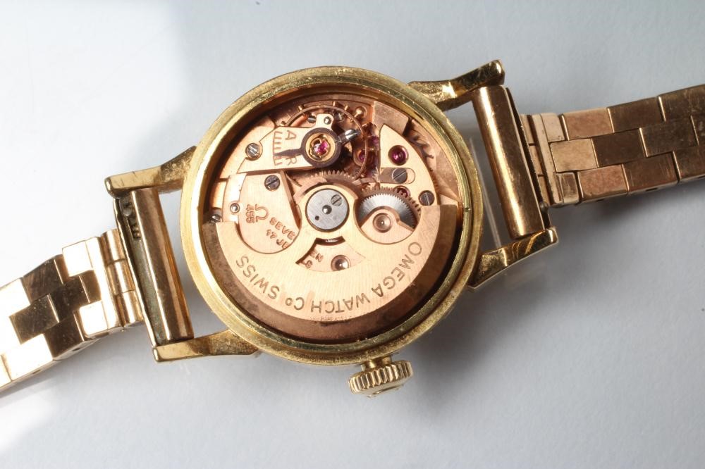 A LADY'S 18CT GOLD OMEGA "LADYMATIC" WRISTWATCH Image
