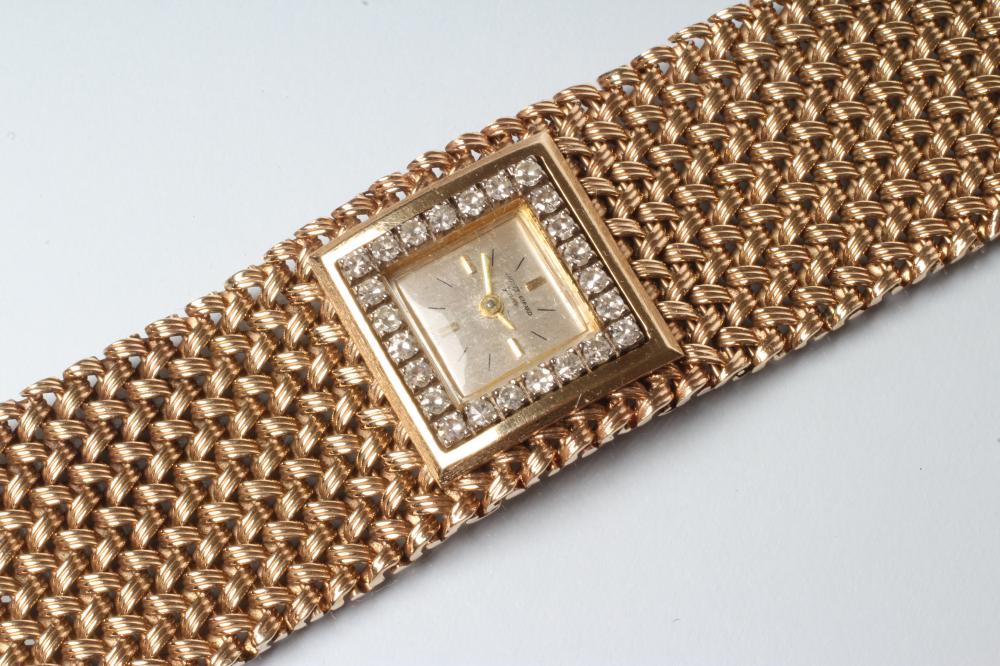 A LADY'S 9CT GOLD AND DIAMOND JAQUET-GIRARD COCKTAIL WATCH Image