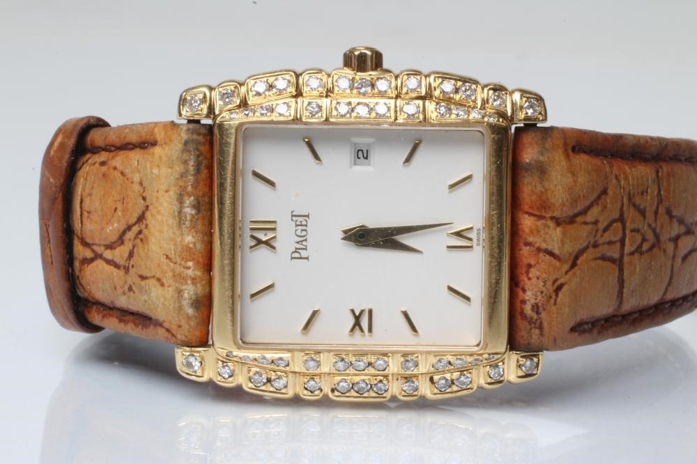 A LADY'S 18CT GOLD AND DIAMOND PIAGET WRISTWATCH Image