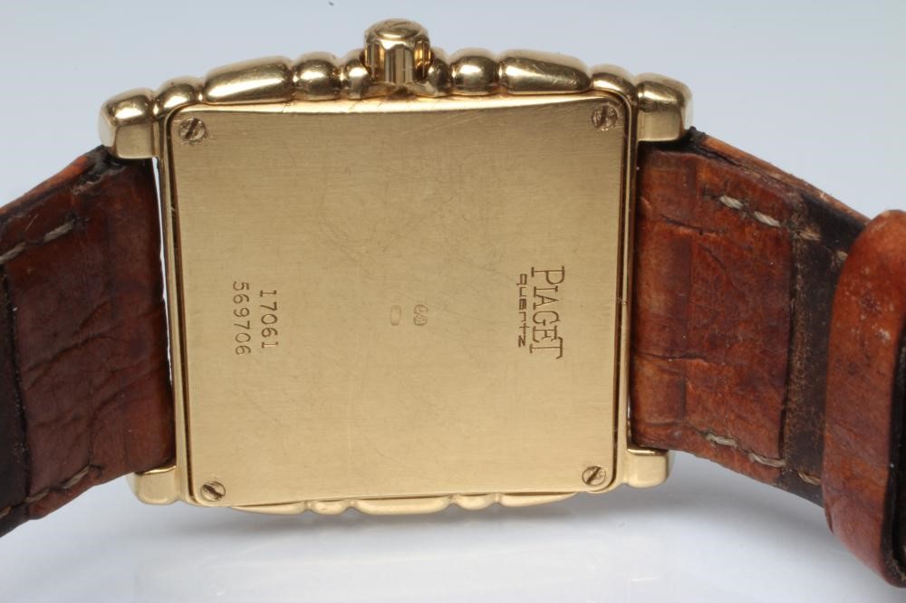 A LADY'S 18CT GOLD AND DIAMOND PIAGET WRISTWATCH Image