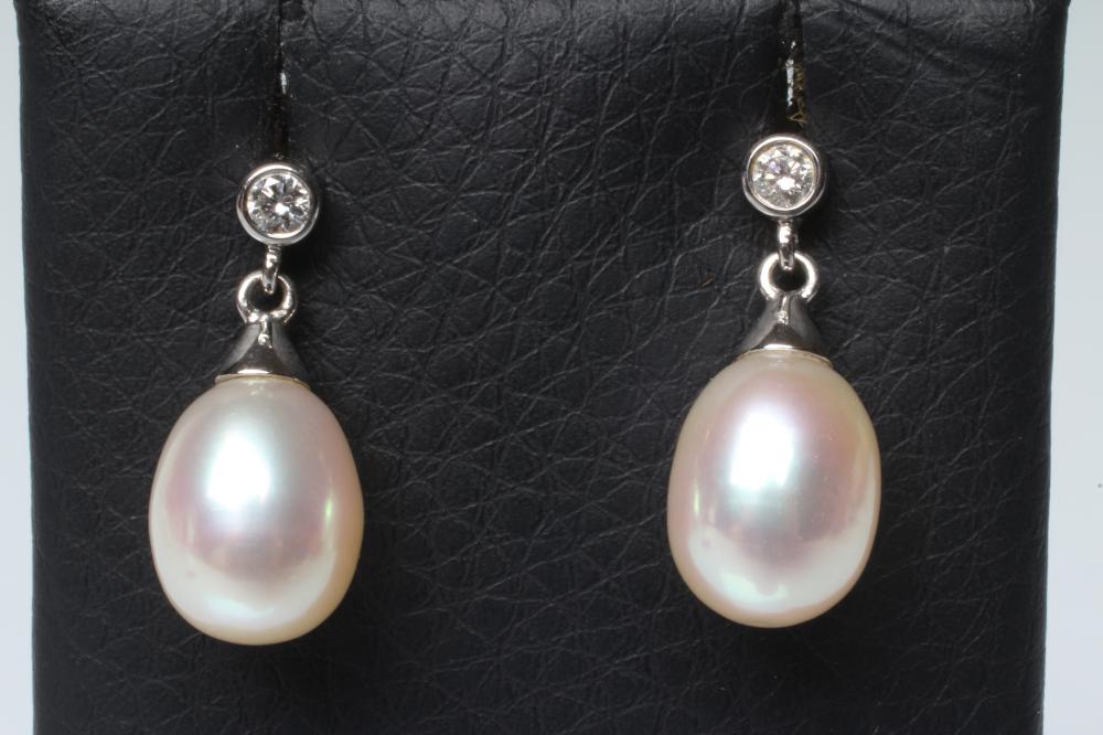 A PAIR OF PEARL DROP EARRINGS Image