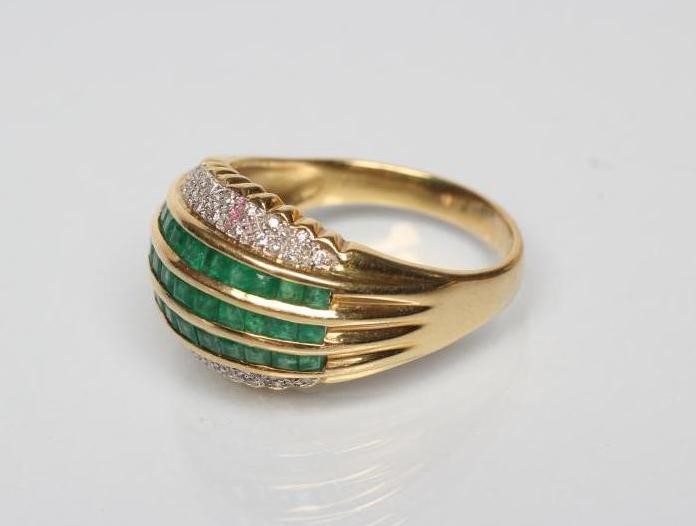 AN EMERALD AND DIAMOND COCKTAIL RING Image