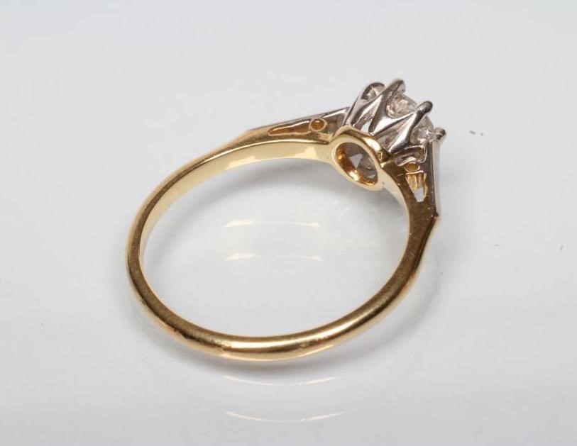 A SOLITAIRE DIAMOND RING Image