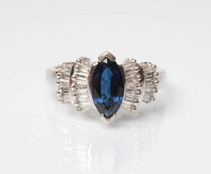 A SAPPHIRE AND DIAMOND DRESS RING Image