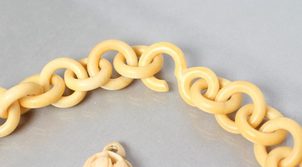 A VICTORIAN IVORY CROSS PENDANT of open form Image