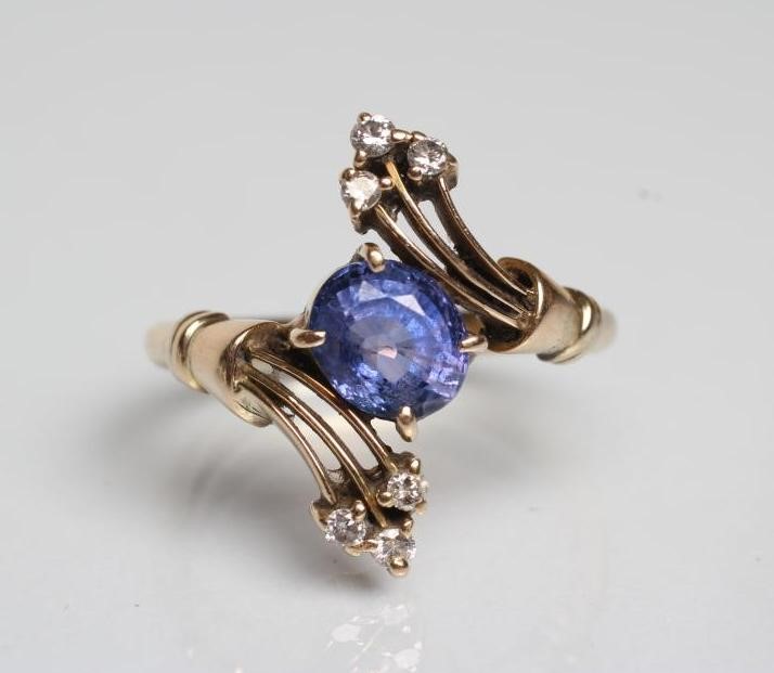 A SAPPHIRE AND DIAMOND COCKTAIL RING Image
