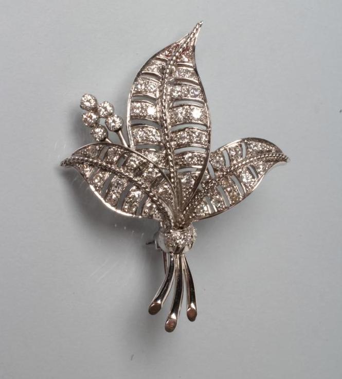 A DIAMOND LEAF BROOCH Image