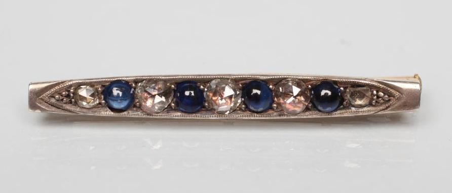 A SAPPHIRE AND DIAMOND BAR BROOCH Image