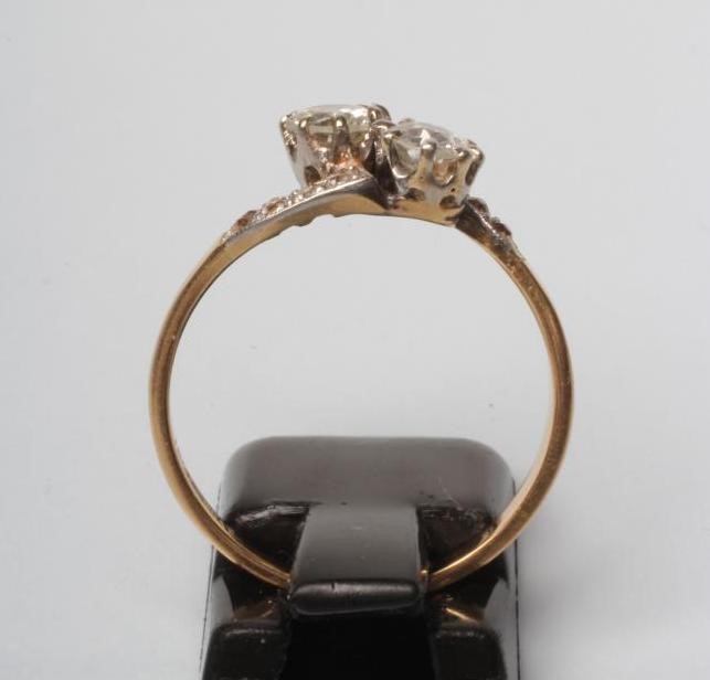 A TWO STONE DIAMOND CROSSOVER RING Image