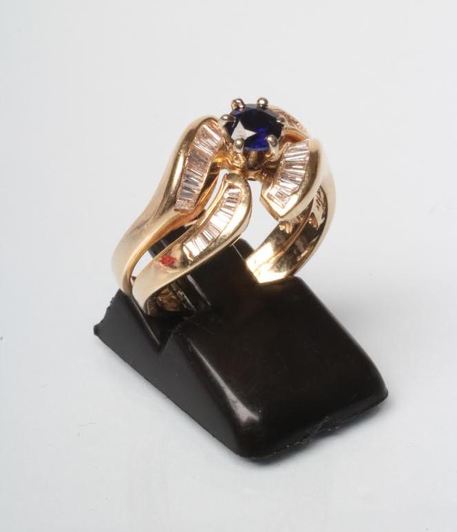 A SAPPHIRE AND DIAMOND DRESS RING Image