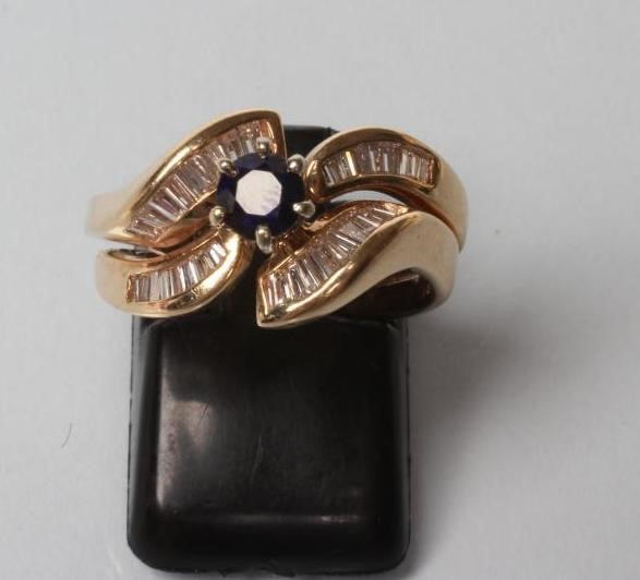 A SAPPHIRE AND DIAMOND DRESS RING Image