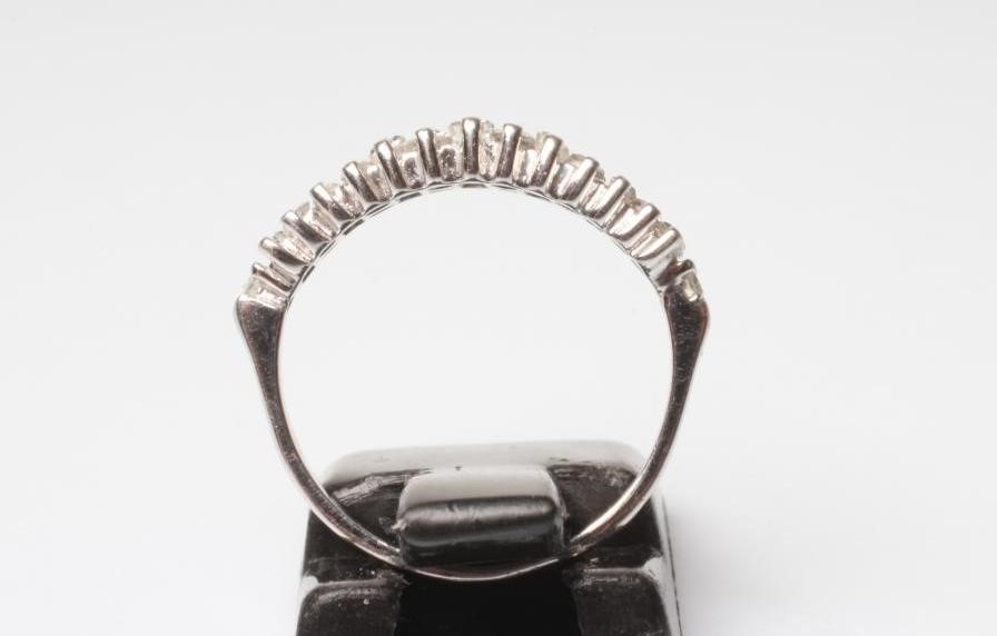 A DIAMOND HALF HOOP RING Image