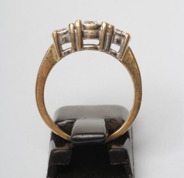 A THREE STONE DIAMOND RING Image