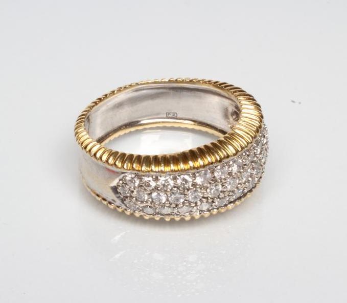 A DIAMOND HALF HOOP ETERNITY RING Image