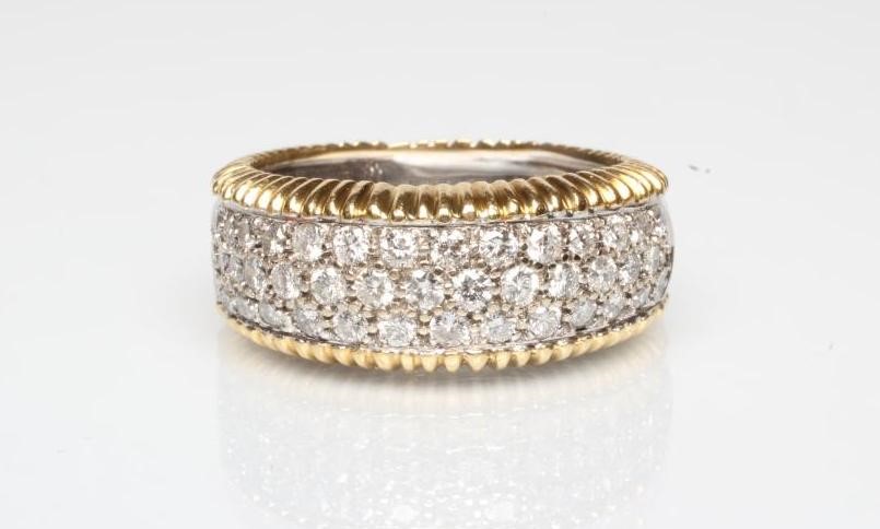 A DIAMOND HALF HOOP ETERNITY RING Image