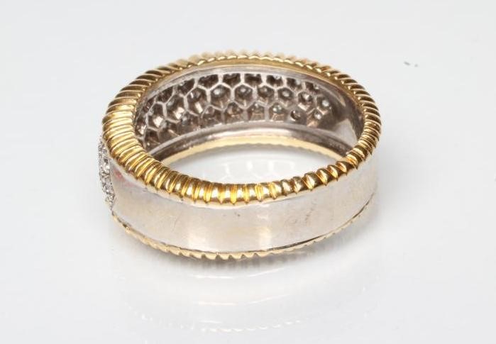 A DIAMOND HALF HOOP ETERNITY RING Image