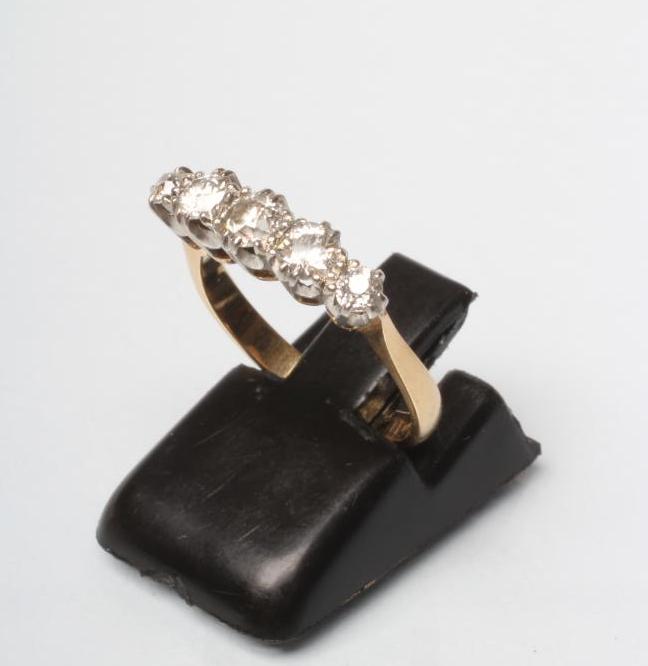 A FIVE STONE DIAMOND RING Image