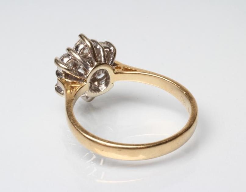 A DIAMOND CLUSTER RING Image