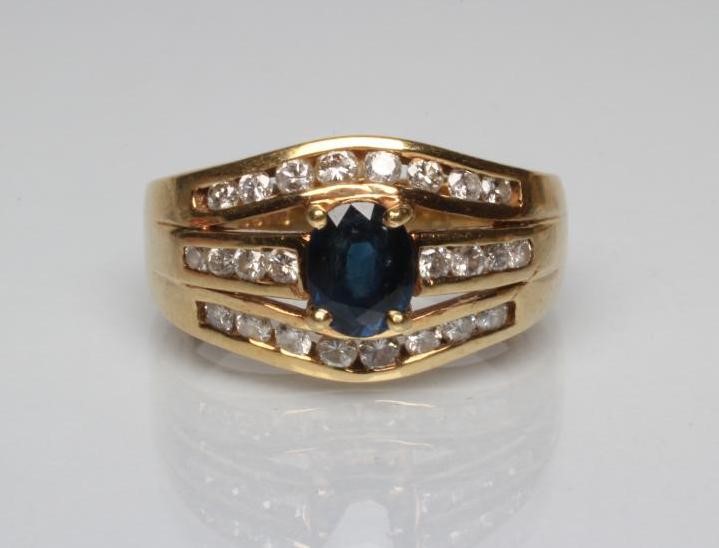 A SAPPHIRE AND DIAMOND DRESS RING Image
