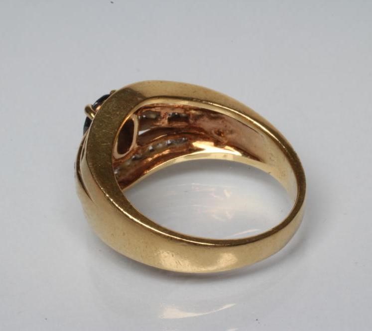 A SAPPHIRE AND DIAMOND DRESS RING Image