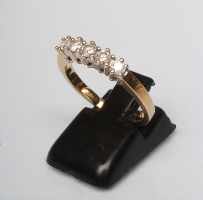 A FIVE STONE DIAMOND RING Image