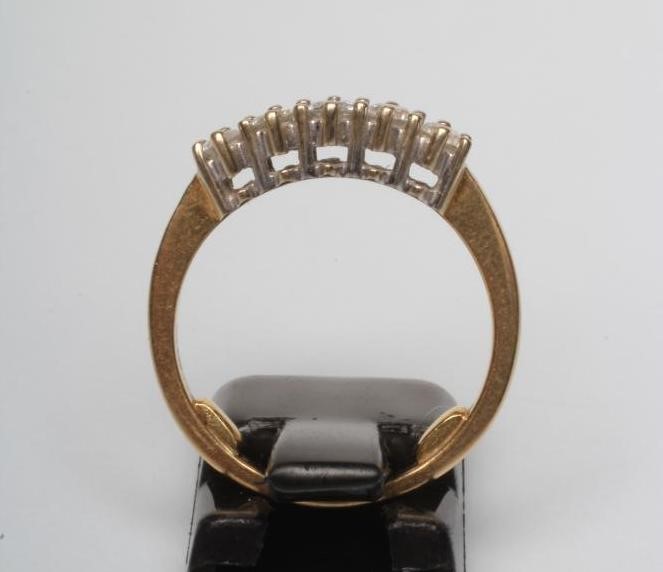 A FIVE STONE DIAMOND RING Image