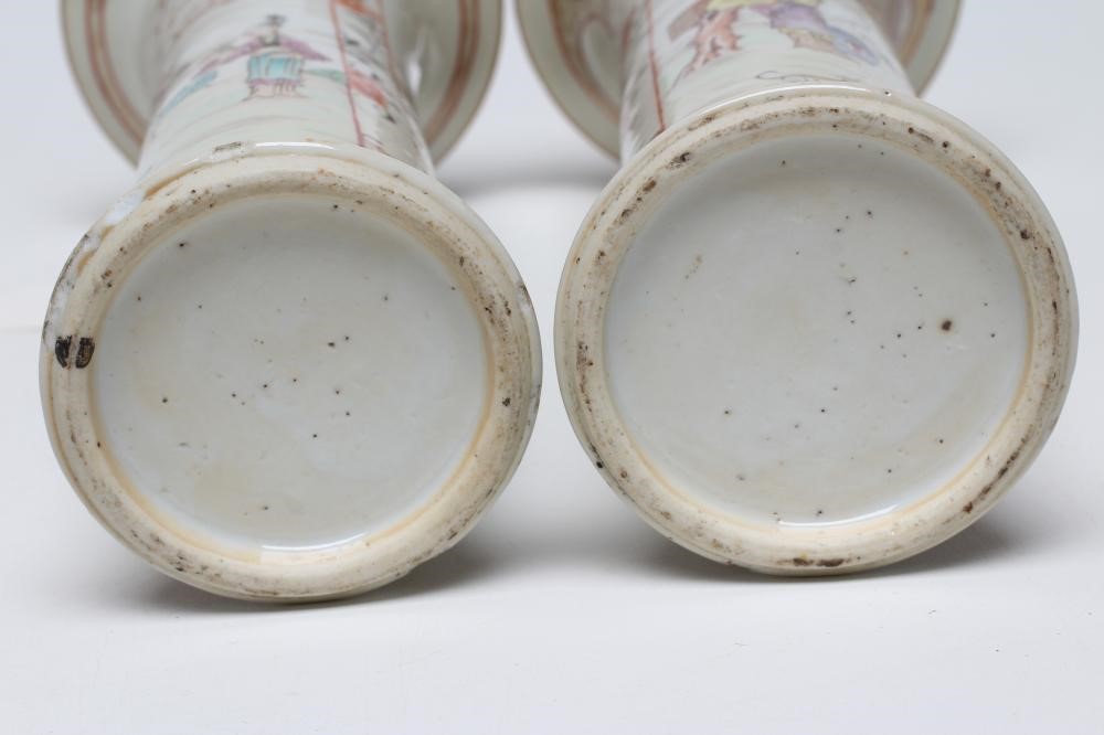 A PAIR OF CHINESE PORCELAIN VASES of waisted cylindrical form painted in coloured enamels with Image