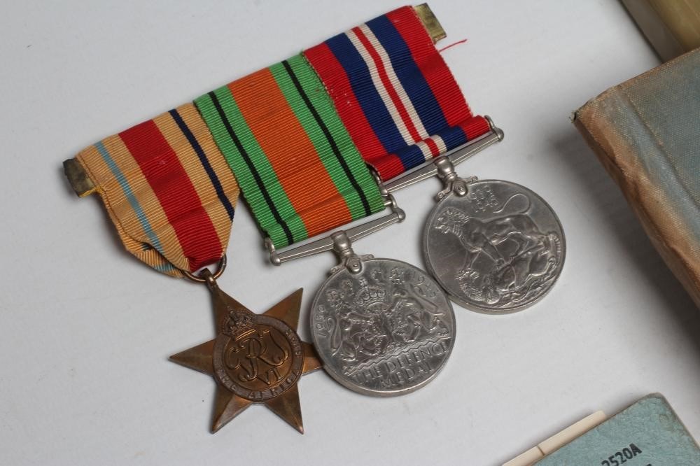 A FAMILY OF SECOND WORLD WAR MEDALS AWARDED TO ERIC WILFRED JONES AND TWO FLYING LOG BOOKS Image