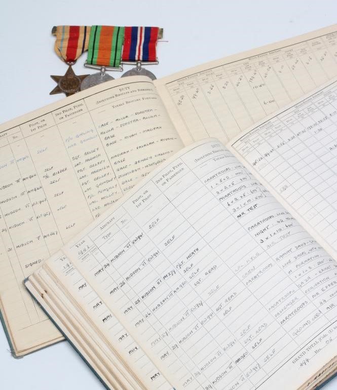 A FAMILY OF SECOND WORLD WAR MEDALS AWARDED TO ERIC WILFRED JONES AND TWO FLYING LOG BOOKS Image