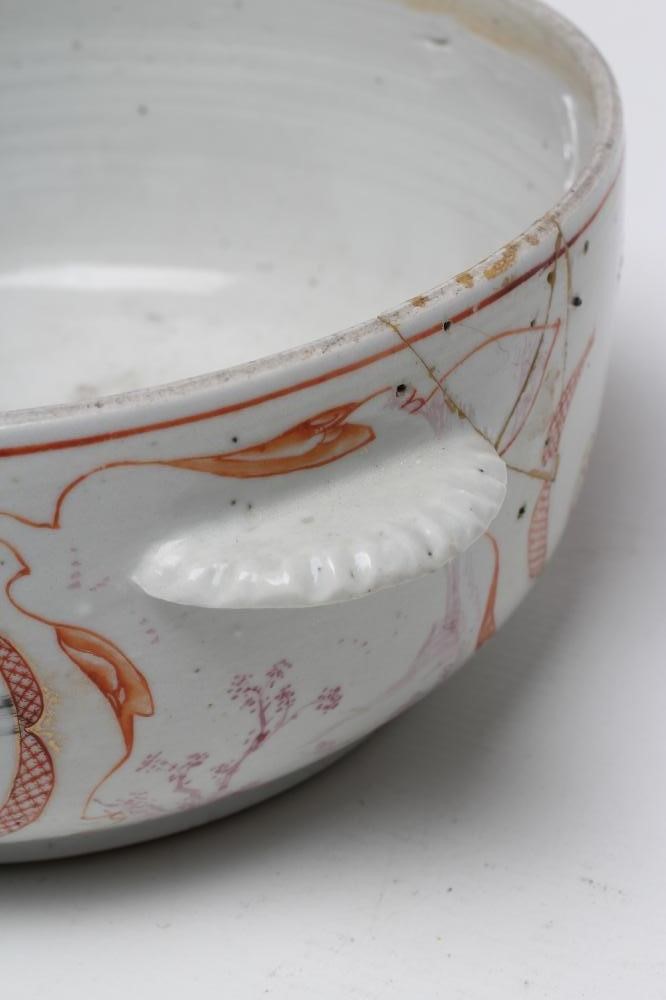 A CHINESE PORCELAIN TUREEN of plain circular form with two lug handles Image