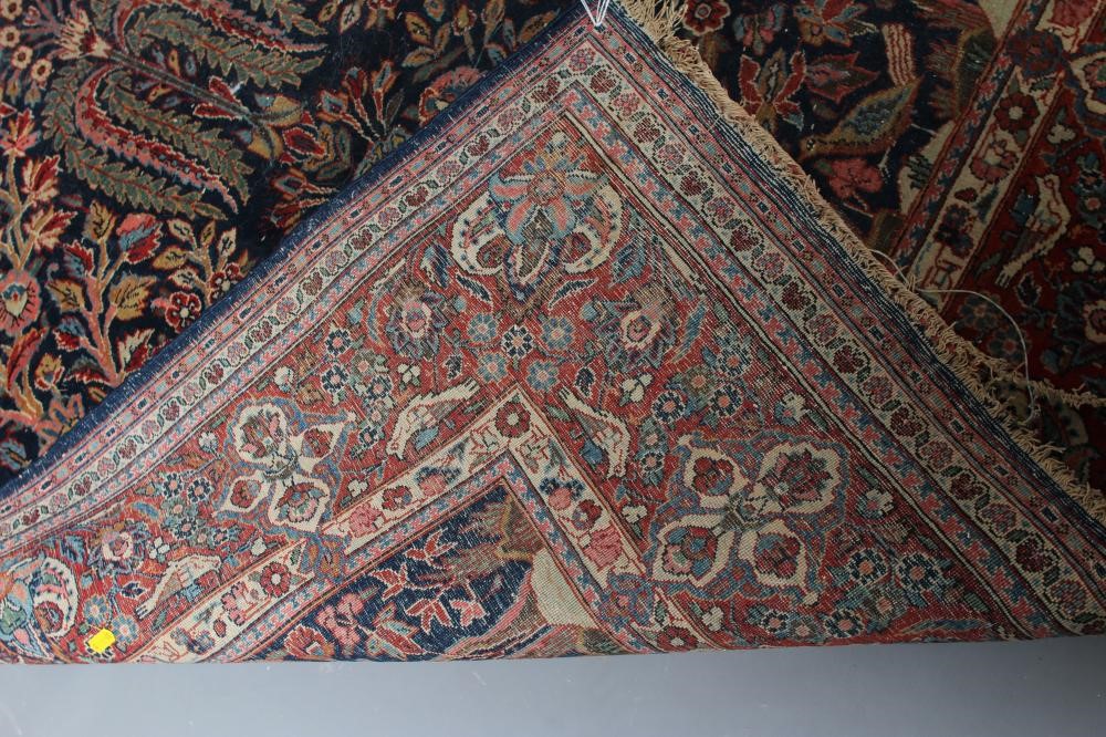 A PERSIAN RUG Image