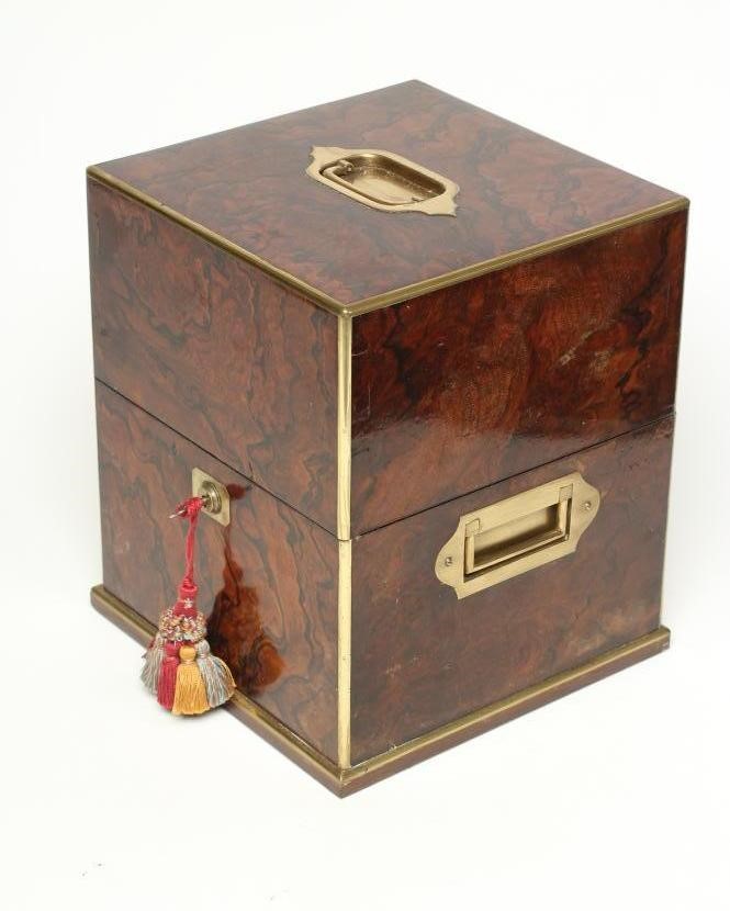 AN EARLY VICTORIAN BURR WALNUT DECANTER BOX of square form with brass mounts and campaign handles Image