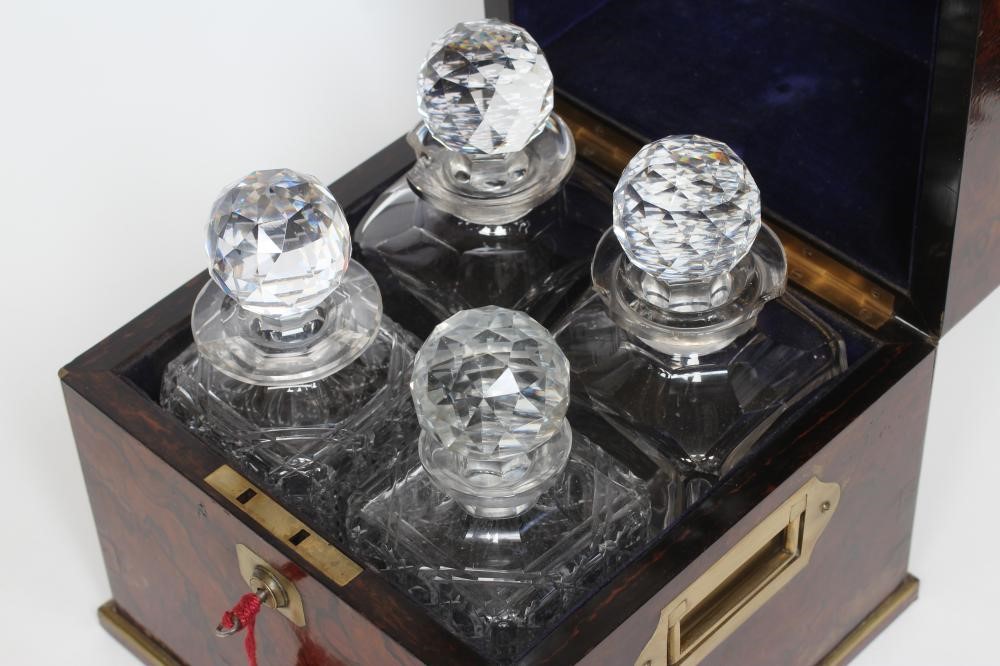 AN EARLY VICTORIAN BURR WALNUT DECANTER BOX of square form with brass mounts and campaign handles Image