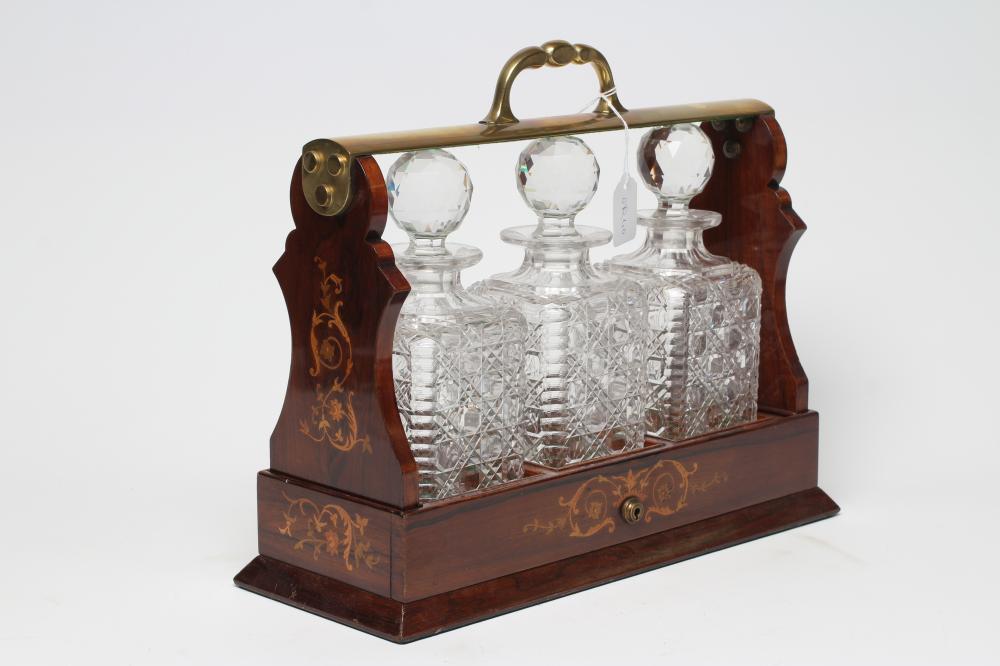 A LATE VICTORIAN ROSEWOOD AND FOLIATE MARQUETRY TANTALUS Image