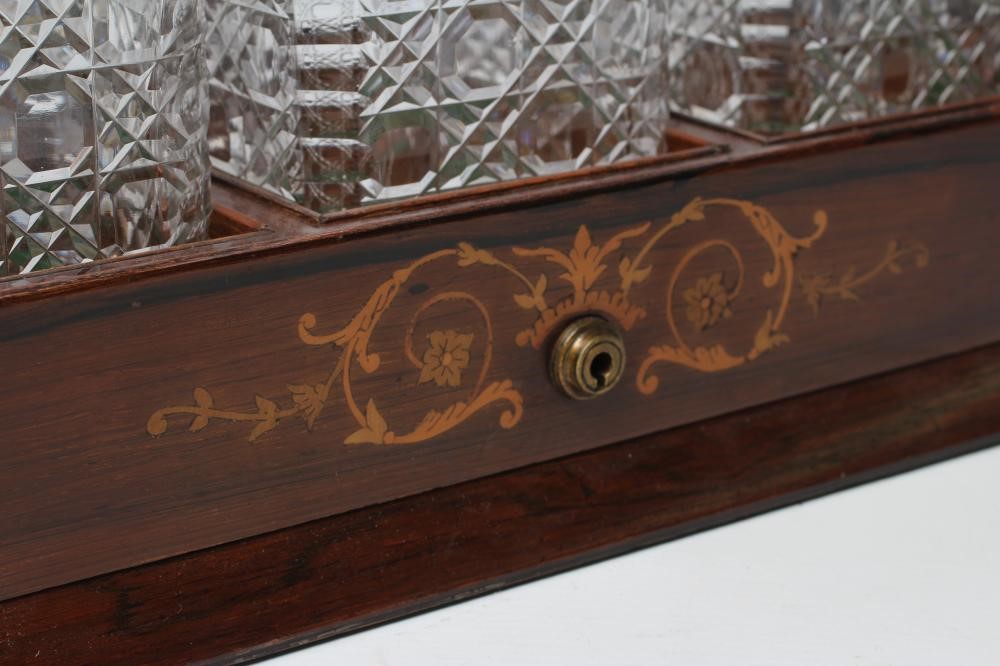 A LATE VICTORIAN ROSEWOOD AND FOLIATE MARQUETRY TANTALUS Image