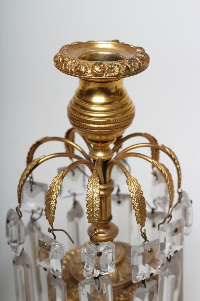 A PAIR OF REGENCY GILT METAL CANDLE LUSTRES Image
