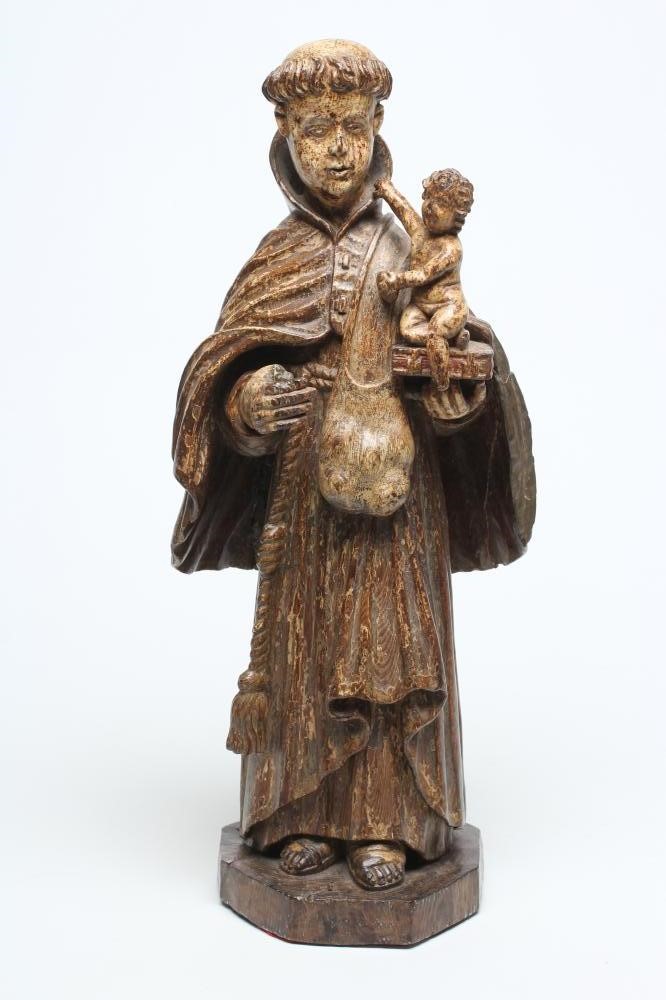 A CARVED WOOD AND PAINTED FIGURE OF ST ANTHONY OF PADUA Image